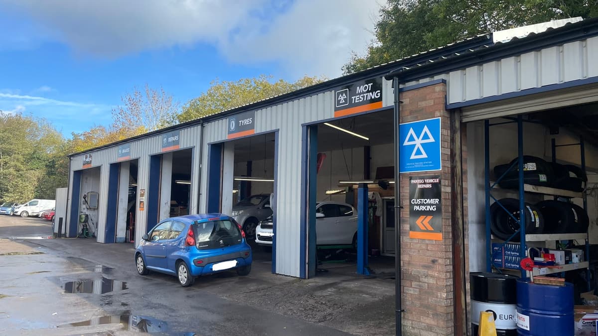 Mechanic working on a car