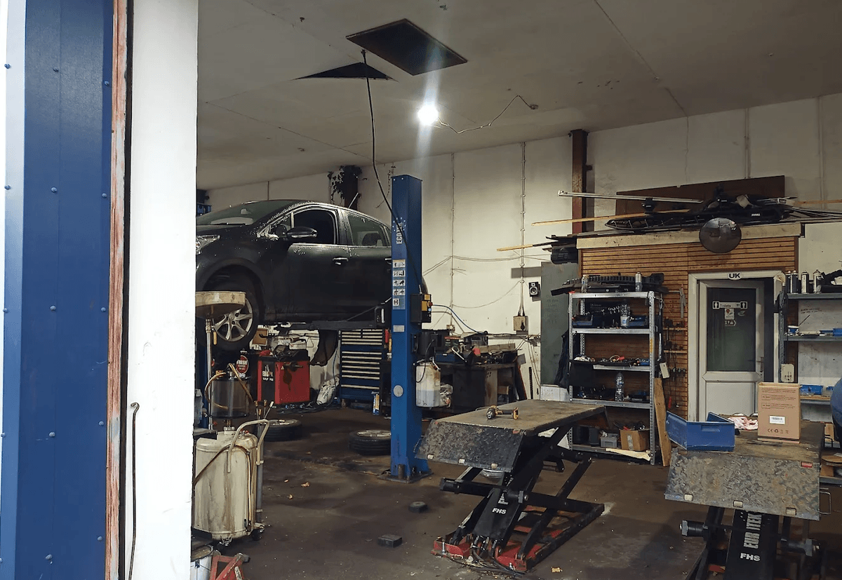 Mechanic working on a car